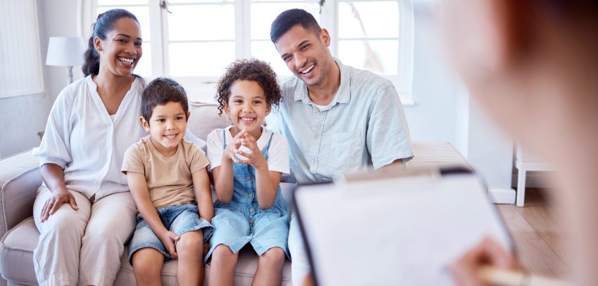 Family smiling after getting life insurance in Belmont, NC