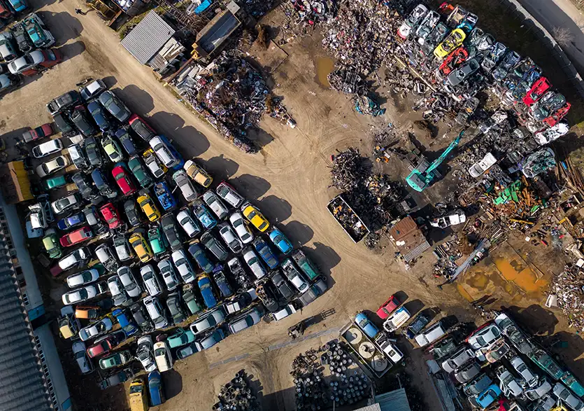 An auto dismantling yard covered by specialized business insurance in Belmont, NC